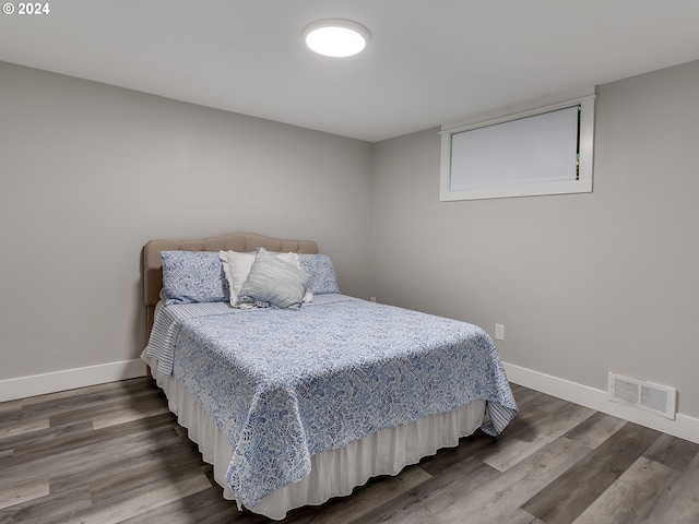 bedroom featuring hardwood / wood-style flooring