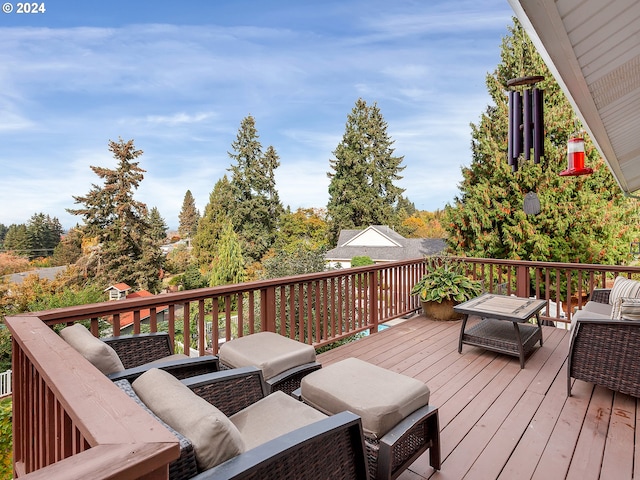 deck with an outdoor hangout area