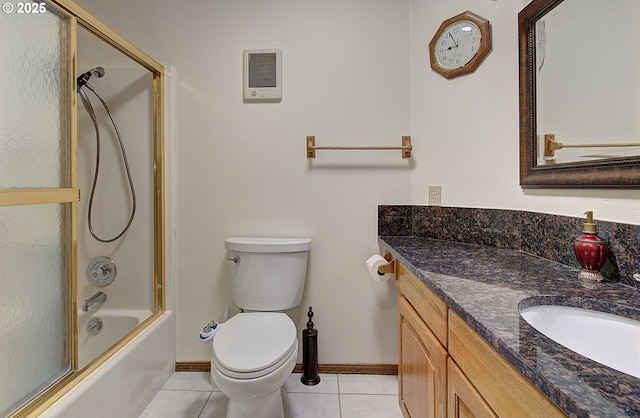 13107 SE 26th St, Vancouver, WA 98683 - full bathroom featuring vanity, toilet, baseboards, bath / shower combo with glass door, and tile patterned floors