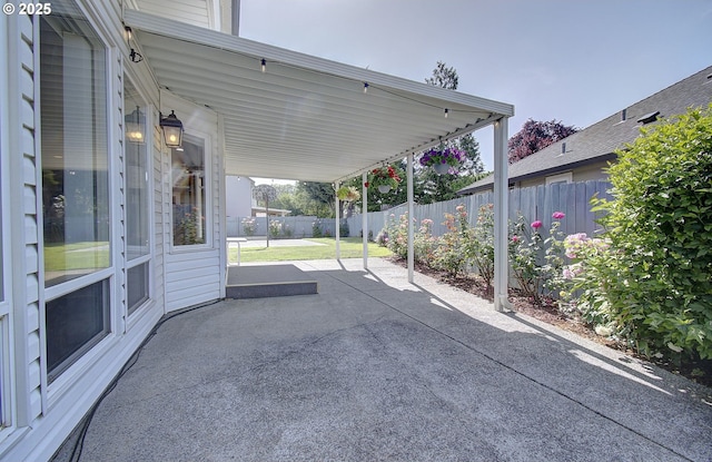 13107 SE 26th St, Vancouver, WA 98683 - fenced backyard with a patio and a carport