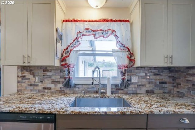 2919 SE 3rd Ave, Camas, WA 98607 - kitchen with dishwasher, light stone counters, decorative backsplash, and white cabinetry