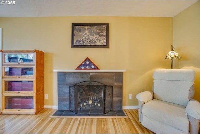2919 SE 3rd Ave, Camas, WA 98607 - sitting room with a tiled fireplace and wood finished floors