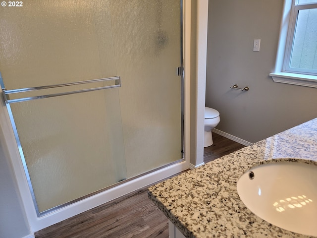 667 SE 5th Ave, Hillsboro, OR 97123 - full bath with wood finished floors, a shower stall, and vanity