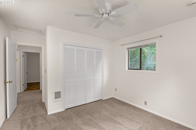 7940 SE 75th Pl, Portland, OR 97206 - unfurnished bedroom with carpet, baseboards, a closet, and a ceiling fan