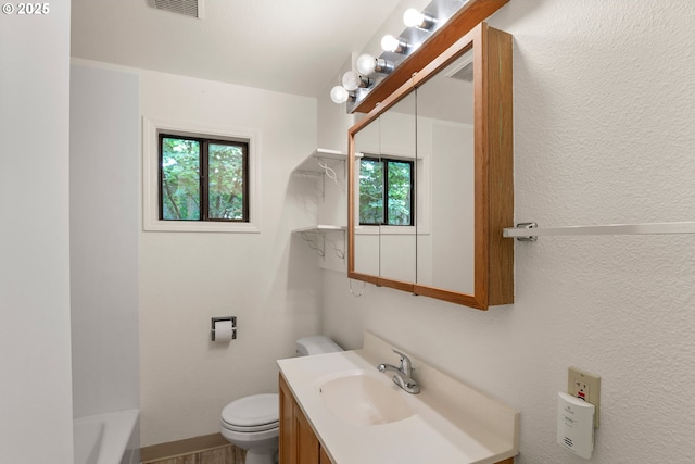 7940 SE 75th Pl, Portland, OR 97206 - full bath featuring vanity, plenty of natural light, toilet, and a bath