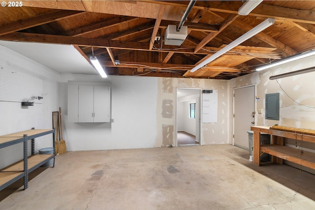 7940 SE 75th Pl, Portland, OR 97206 - garage featuring electric panel and a garage door opener