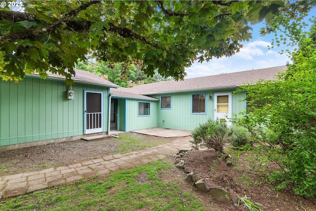 7940 SE 75th Pl, Portland, OR 97206 - back of property with a patio area and roof with shingles