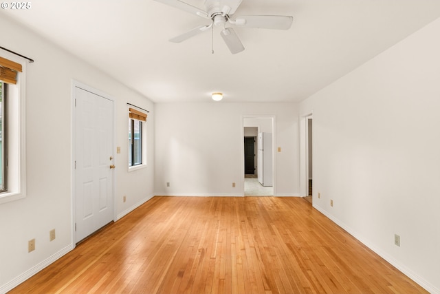 7940 SE 75th Pl, Portland, OR 97206 - spare room featuring light wood-style floors, baseboards, and a ceiling fan