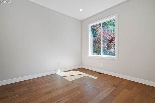 16010 NE 152nd Ave, Brush Prairie, WA 98606 - spare room featuring baseboards, wood finished floors, and recessed lighting