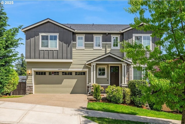 2025 De Vries Way W, Linn, OR 97068 - craftsman-style house featuring board and batten siding, driveway, a garage, and stone siding