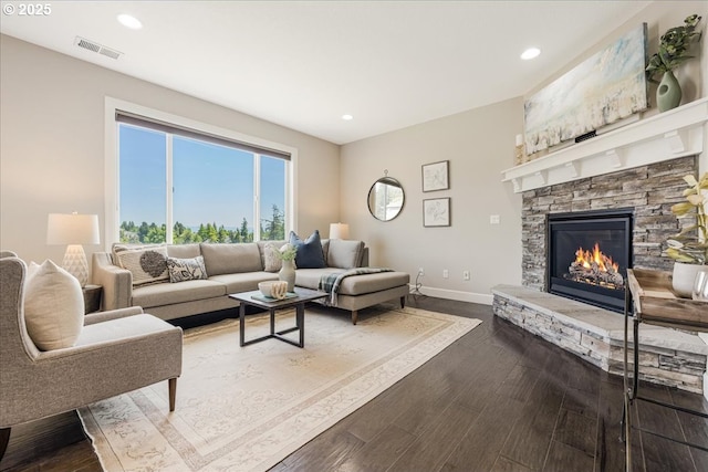 2025 De Vries Way W, Linn, OR 97068 - living room featuring recessed lighting, a stone fireplace, baseboards, and dark wood finished floors