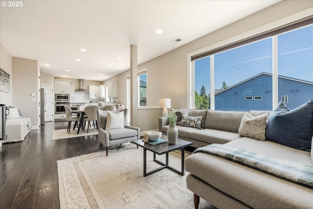 2025 De Vries Way W, Linn, OR 97068 - living room featuring dark wood-type flooring, recessed lighting, and baseboards