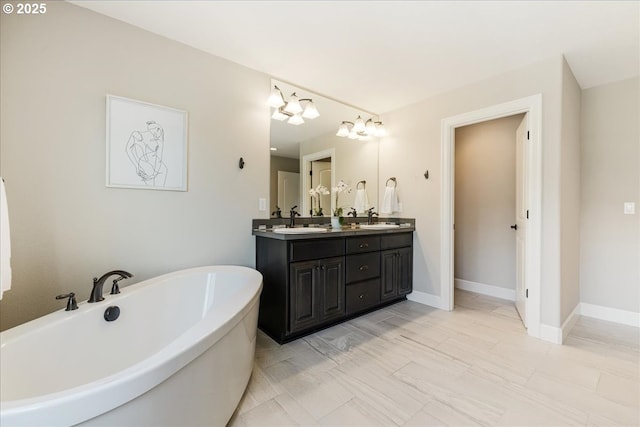 2025 De Vries Way W, Linn, OR 97068 - bathroom featuring double vanity and a soaking tub