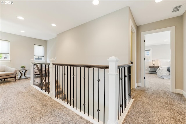 2025 De Vries Way W, Linn, OR 97068 - hallway featuring carpet flooring, an upstairs landing, recessed lighting, and baseboards