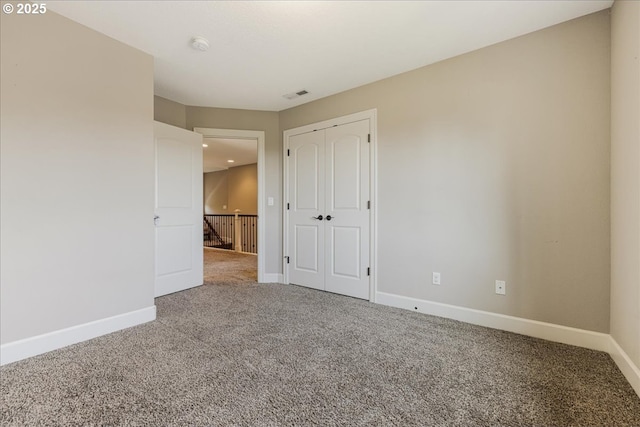 2025 De Vries Way W, Linn, OR 97068 - unfurnished bedroom with carpet, baseboards, a closet, and recessed lighting