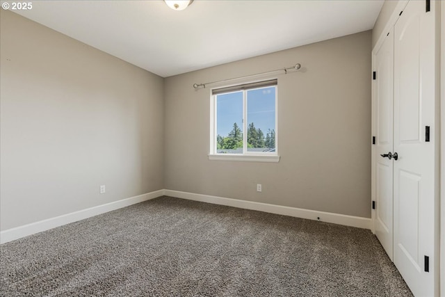 2025 De Vries Way W, Linn, OR 97068 - unfurnished bedroom featuring a closet, baseboards, and carpet flooring