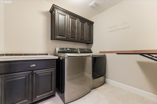 2025 De Vries Way W, Linn, OR 97068 - laundry area with cabinet space, washing machine and dryer, baseboards, and a textured ceiling