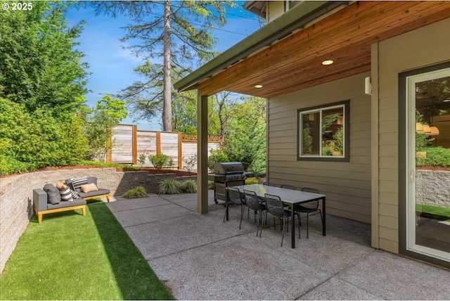 4726 SW 60th Pl, Portland, OR 97221 - view of patio featuring grilling area, outdoor dining space, and fence