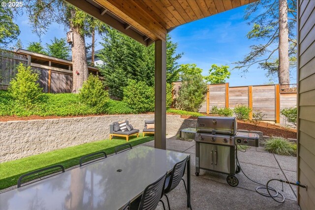 4726 SW 60th Pl, Portland, OR 97221 - view of patio / terrace with a fenced backyard and a grill