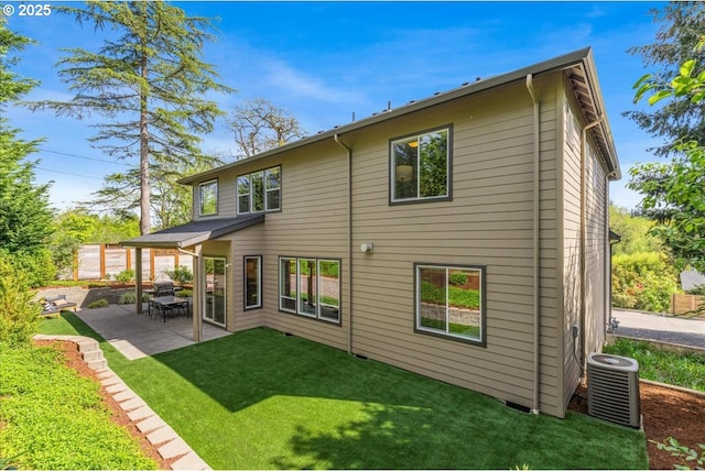 4726 SW 60th Pl, Portland, OR 97221 - back of property with cooling unit, a patio area, and a yard