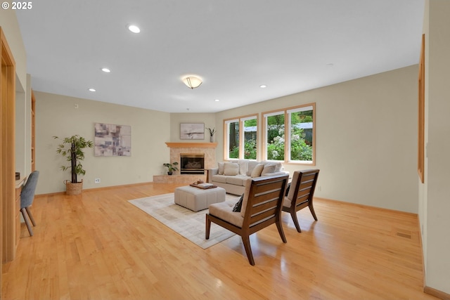 2038 Morning View Dr, Eugene, OR 97405 - living room with light wood-style floors, a fireplace, and recessed lighting