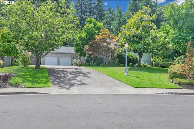 2038 Morning View Dr, Eugene, OR 97405 - obstructed view of property with concrete driveway and a garage