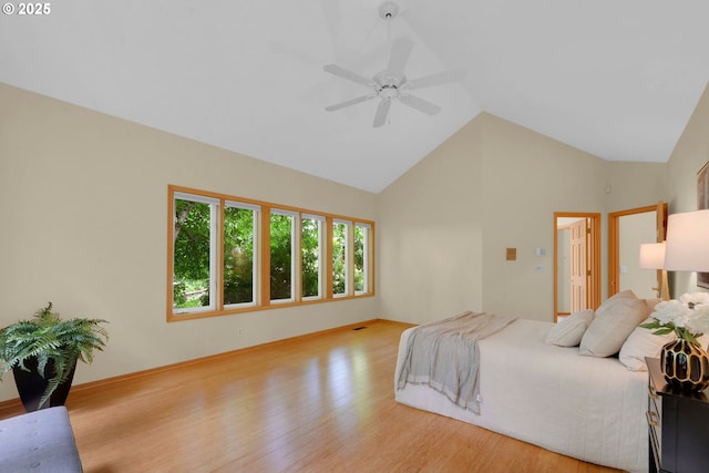 2038 Morning View Dr, Eugene, OR 97405 - bedroom featuring wood finished floors, high vaulted ceiling, and ceiling fan