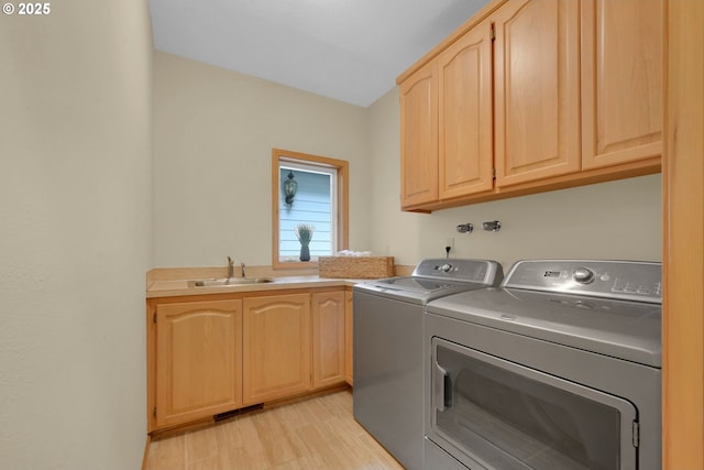 2038 Morning View Dr, Eugene, OR 97405 - laundry area with separate washer and dryer, cabinet space, and light wood-style floors