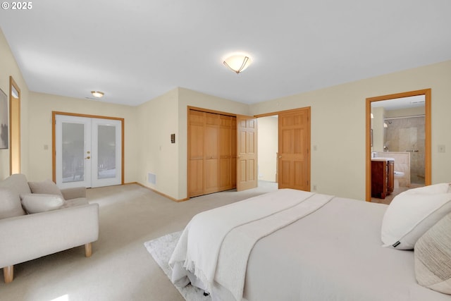 2038 Morning View Dr, Eugene, OR 97405 - bedroom featuring french doors, light colored carpet, ensuite bathroom, a closet, and access to outside