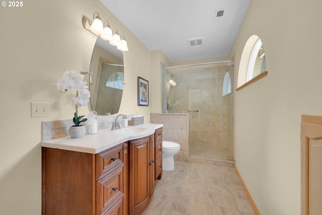 2038 Morning View Dr, Eugene, OR 97405 - bathroom featuring vanity, a tile shower, and healthy amount of natural light
