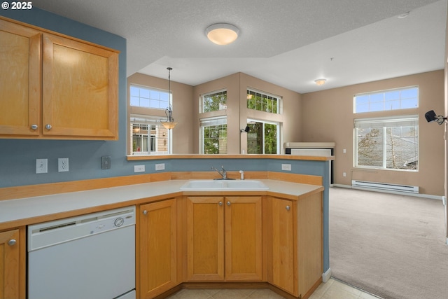 kitchen with sink, dishwasher, kitchen peninsula, a baseboard radiator, and light colored carpet