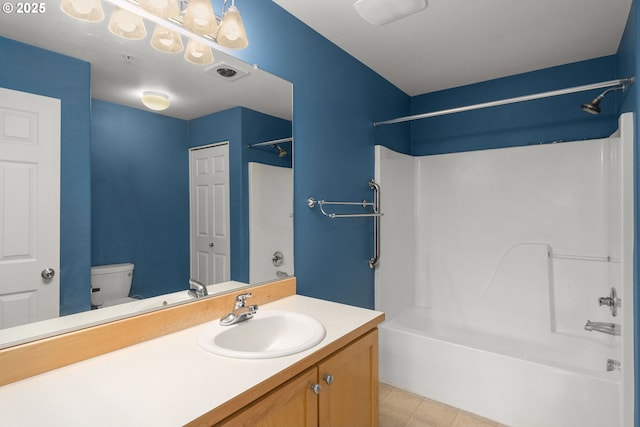 full bathroom featuring shower / bathtub combination, vanity, and toilet