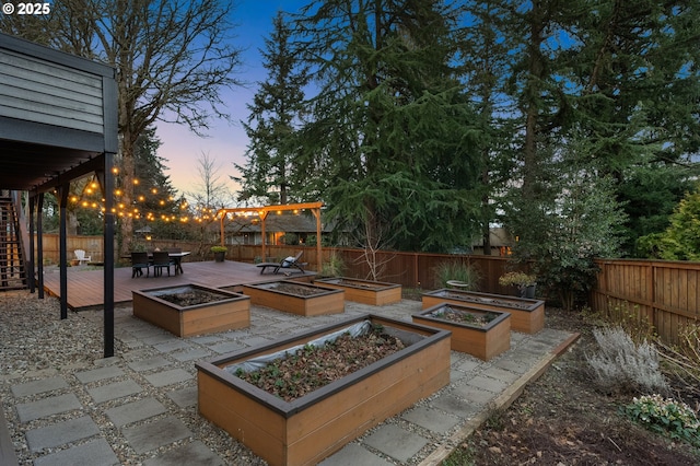 exterior space featuring a fenced backyard and a vegetable garden