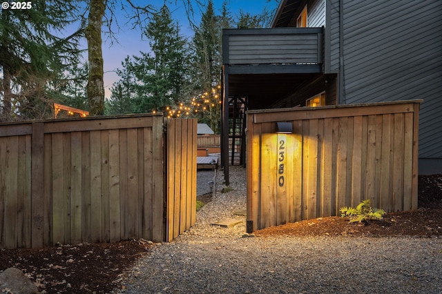 view of gate featuring fence