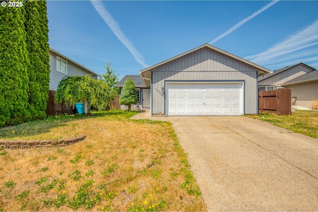 13712 NE 91st St, Vancouver, WA 98682 - ranch-style house with concrete driveway and a garage