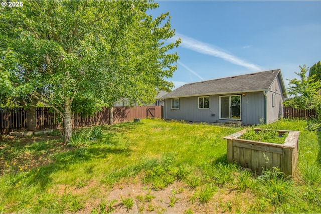 13712 NE 91st St, Vancouver, WA 98682 - back of house with a fenced backyard and a shingled roof