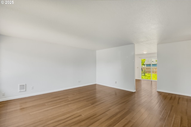 13712 NE 91st St, Vancouver, WA 98682 - empty room featuring wood finished floors