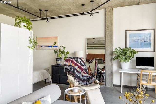 interior space featuring concrete flooring