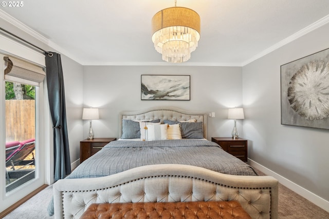 carpeted bedroom featuring access to outside, ornamental molding, baseboards, and a chandelier