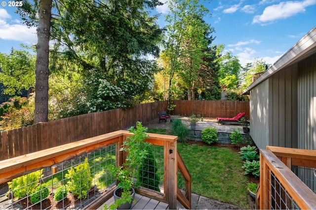 view of yard with a wooden deck