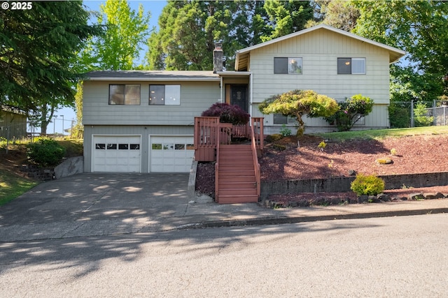 1221 SW Maple St, Dallas, OR 97338 - split level home with a garage and concrete driveway