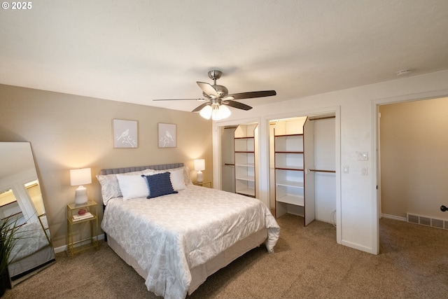 1221 SW Maple St, Dallas, OR 97338 - carpeted bedroom featuring ceiling fan, two closets, and baseboards