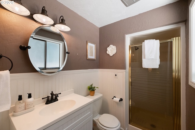 1221 SW Maple St, Dallas, OR 97338 - full bath with a wainscoted wall, a shower stall, vanity, and toilet