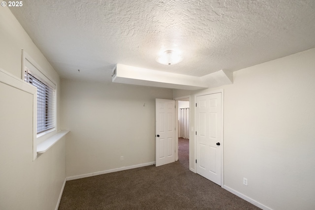 1221 SW Maple St, Dallas, OR 97338 - unfurnished bedroom with carpet flooring, a textured ceiling, and baseboards
