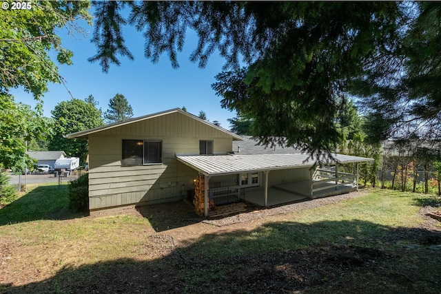 1221 SW Maple St, Dallas, OR 97338 - back of property featuring a lawn and metal roof