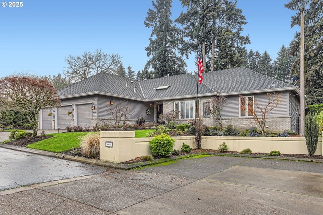 single story home with a garage