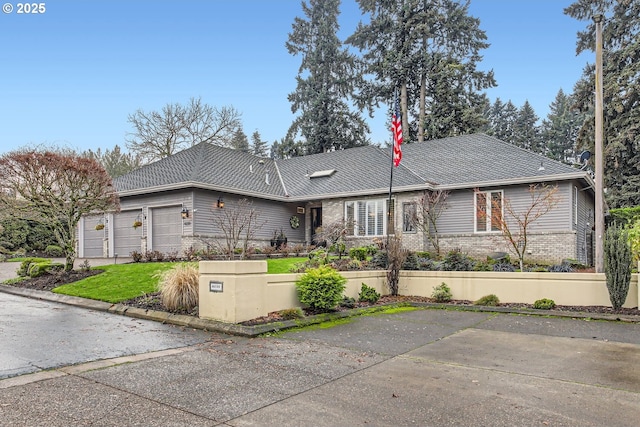 single story home with a garage