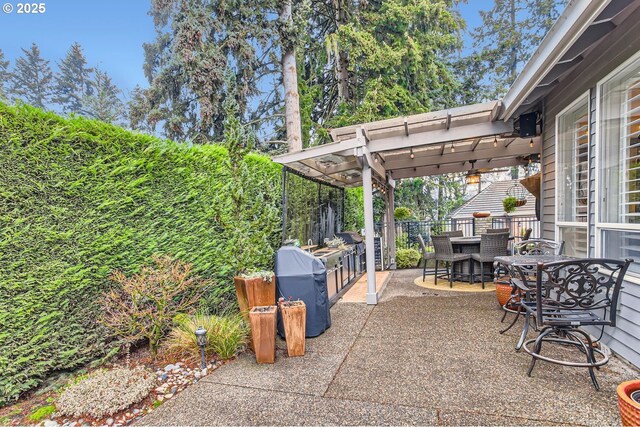 view of patio featuring a pergola