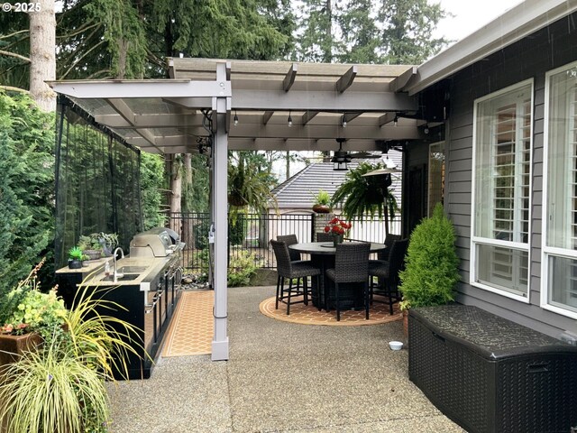 view of patio / terrace featuring grilling area, a pergola, an outdoor wet bar, ceiling fan, and area for grilling