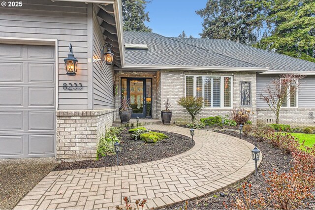 property entrance with a garage